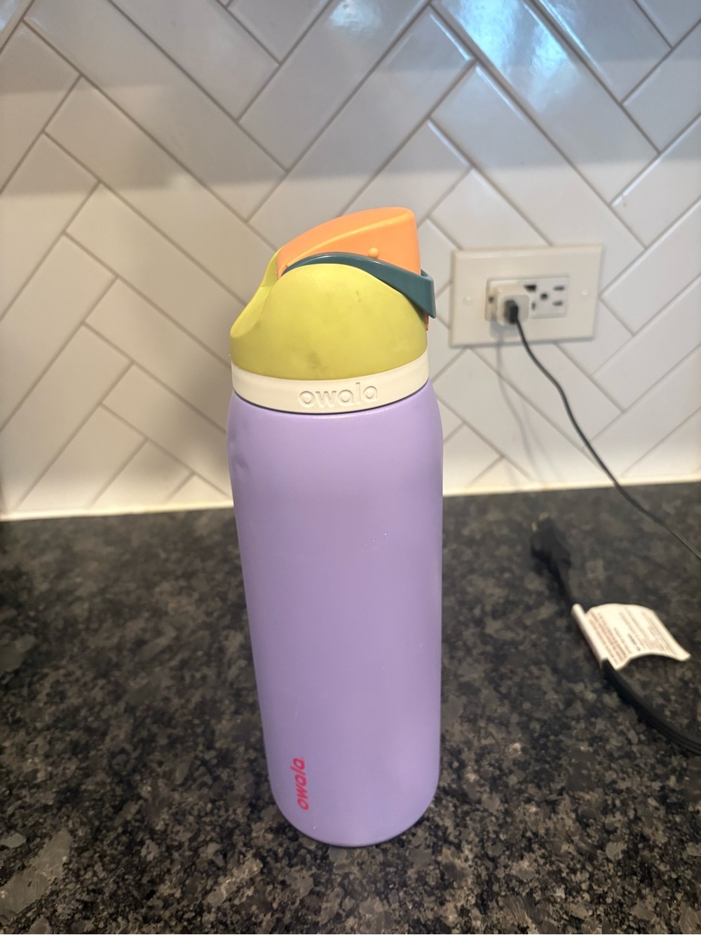 Owala Lavender Stainless Steel Bottle with Yellow & Orange Cap